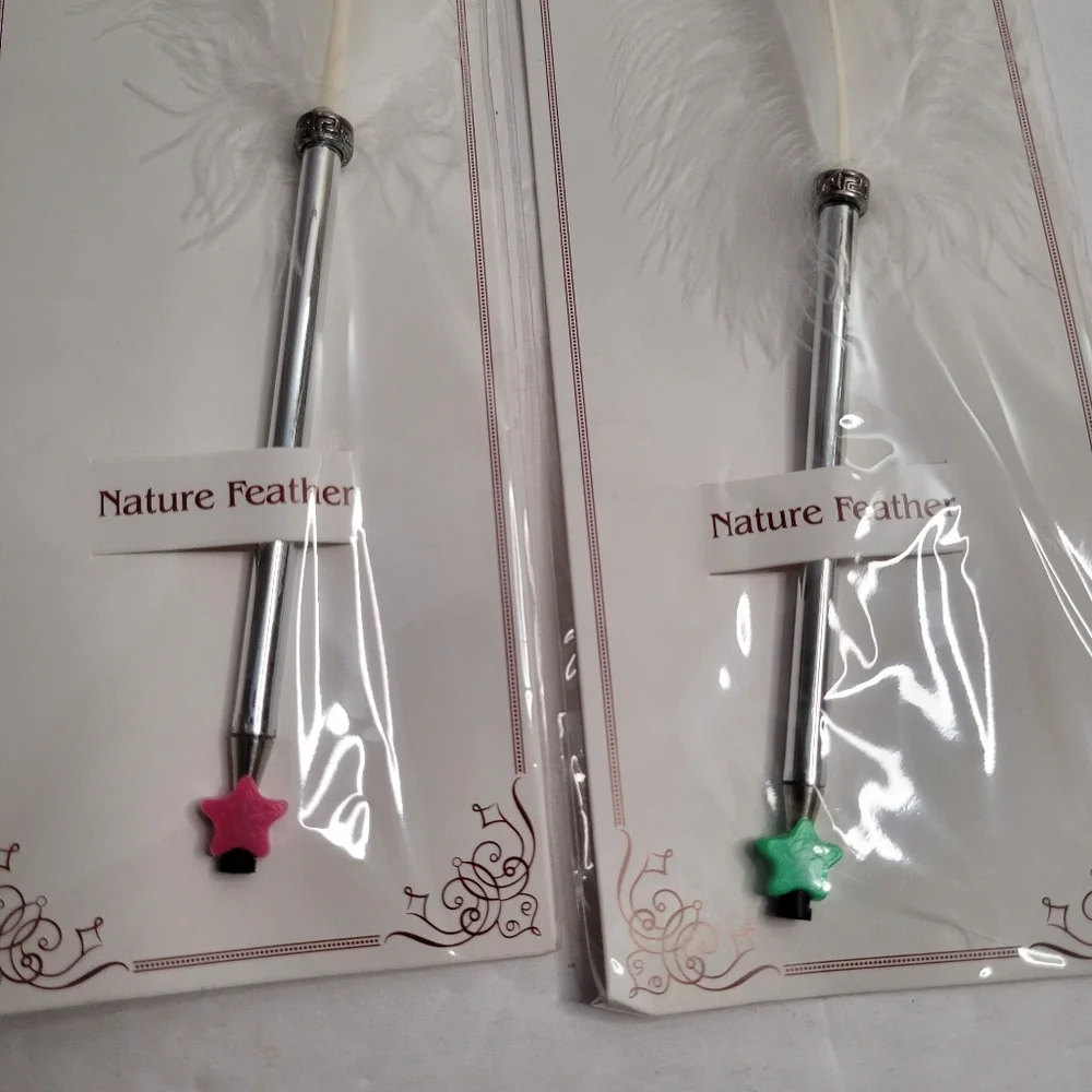 Feather ballpoint pens. 321